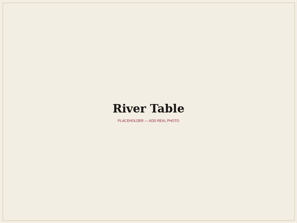 River table with a hand-poured resin river